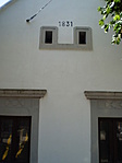 A leírásban szereplő ház az évszámmal